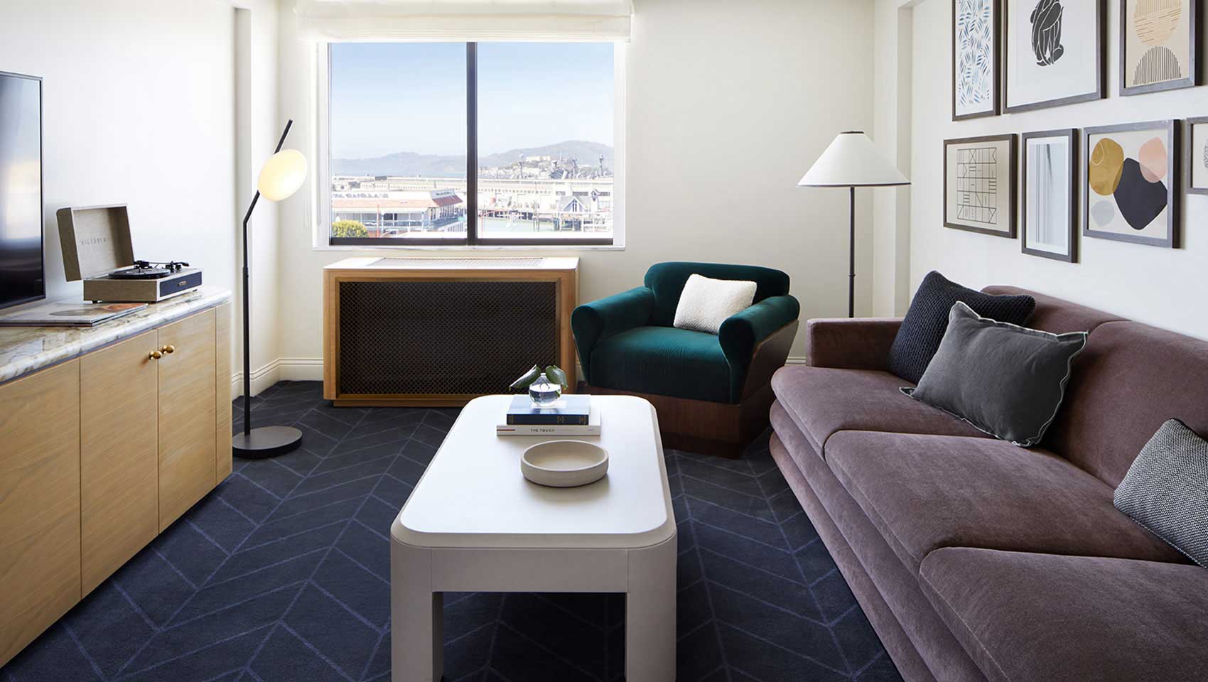 sitting area in guest room at Kimpton Alton Hotel