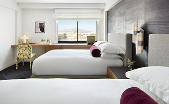 premium double queen suite with two queen beds