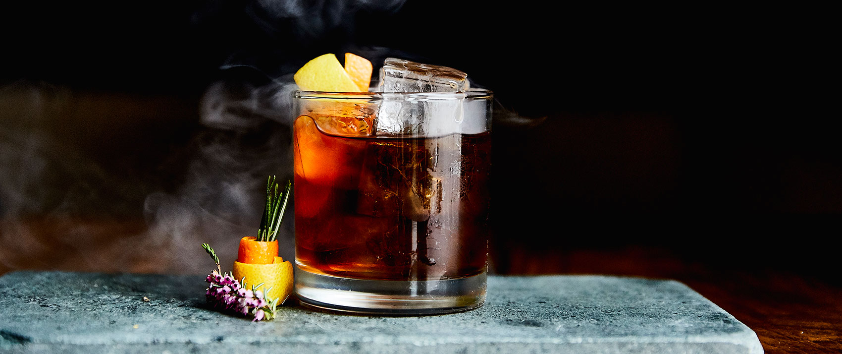 cocktail on a slate serving tray